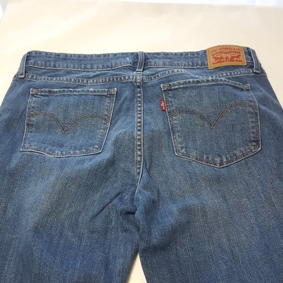 Levi's 711 Medium Wash Mid Rise Skinny Jeans w/ Raw Hem - Picture 2 of 5